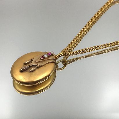 null PENDENTIF «  porte souvenir  » ovale en or jaune (585 millièmes) 14 carats serti...