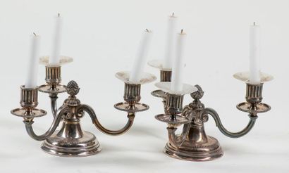 null Pair of silver metal candle holders.