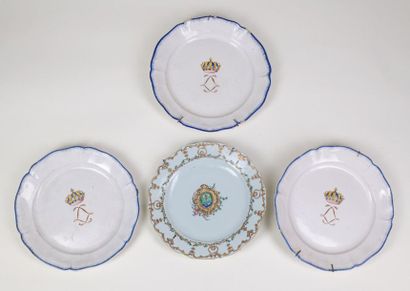 null Three earthenware plates flanked by a ducal crown and an 18th century porcelain...