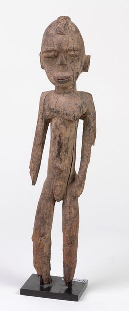null Beautiful classical "bateba" statuette, arms along the body. Hard wood with...
