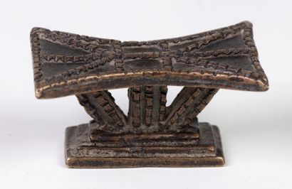 null A magnificent bronze gold weight, representing a "stool of state", stool of...