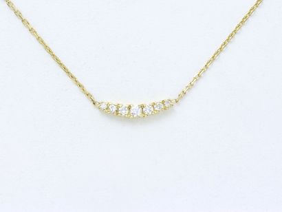 Necklace in gold 750 thousandths, holding...