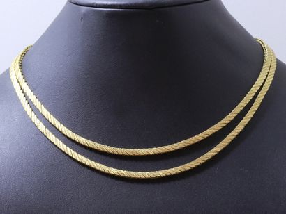 null Flexible gold necklace 750 thousandth, composed of 2 strands, stylized mesh...
