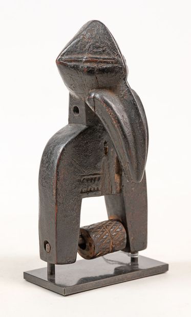  SENOUFO R.COTE D'IVOIRE Weaving loom pulley. Decorated with a finely decorated hornbill...