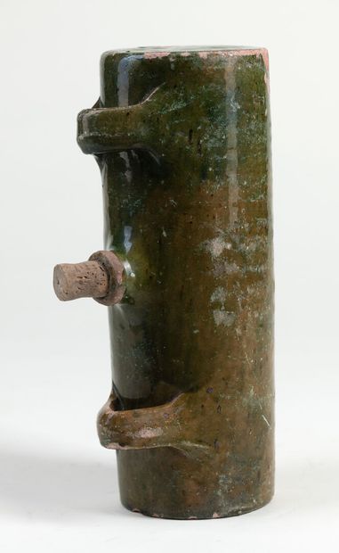 null Terracotta flask and green glaze in Pré d'Auge, H : 29,5cm and a three foot...