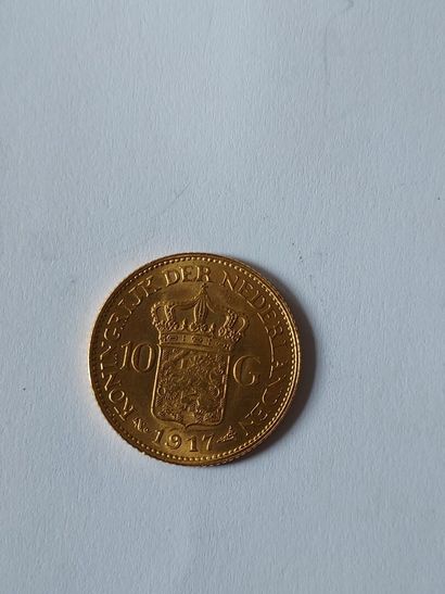 null Pièce de 10 gulden en or 750 millièmes, datée 1917.

Poids: 6.70 g.