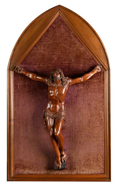 Christ in wood, in low relief on a velvet...