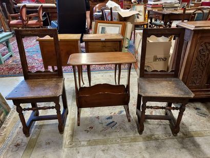 null Pair of wooden chairs and a magazine rack
