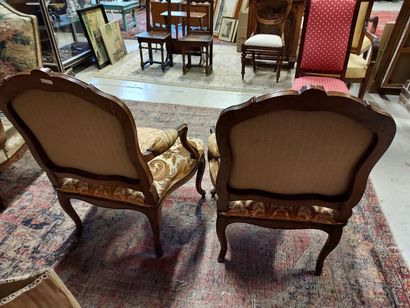 null Pair of armchairs with curved legs, armrests with cuffs, natural wood backs,...