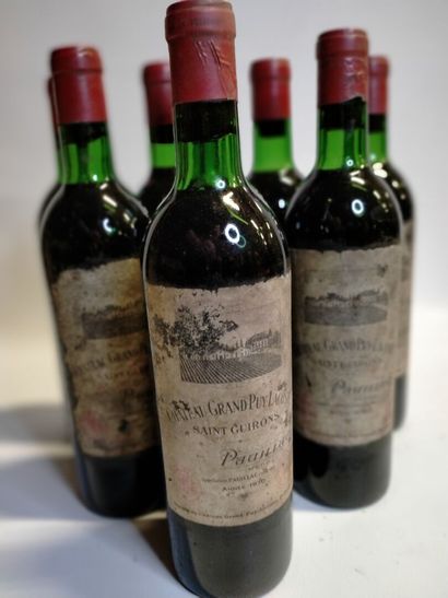 null 
8 bouteilles, Château Grand Puy Lacoste, Paulliac, 1970 (vendu en l'état sans...
