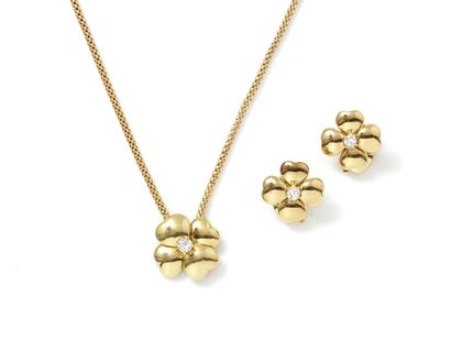 null Half set in gold 750 thousandths with decoration of flowers, the pistils decorated...