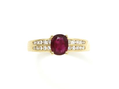 null Ring in gold 750 thousandths decorated with a facetted oval ruby of beautiful...
