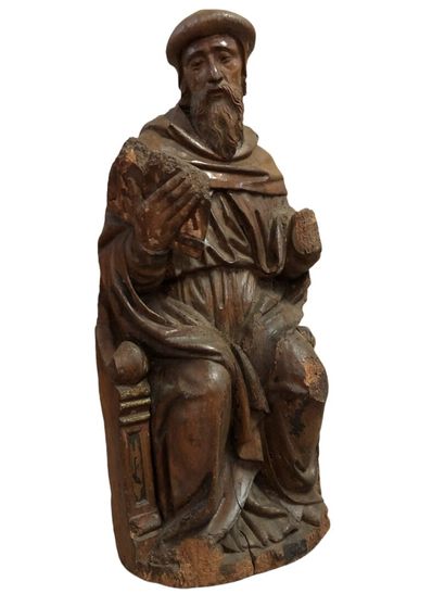 null Oak sculpture with traces of polychromy "Doctor of the Law" seated on a stall,...