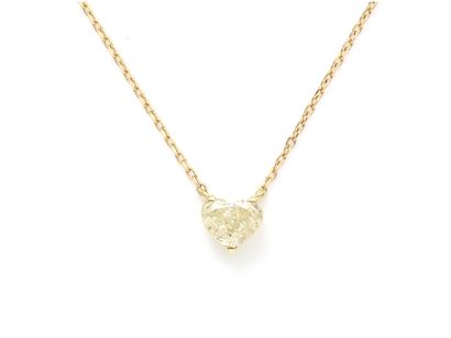 null Necklace in gold 750 thousandths, centered in pendant of a diamond cut heart...