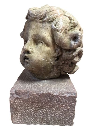null 
Putti head in stone, Burgundy? 17th century? Stone base, Height: 27 cm, 40...