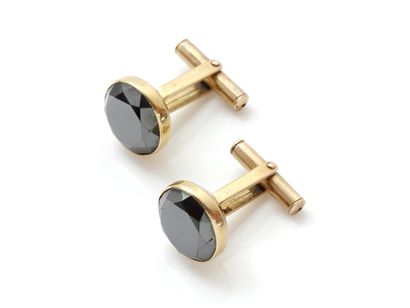null Pair of cufflinks in gold 585 thousandths, decorated with round pastilles heightened...