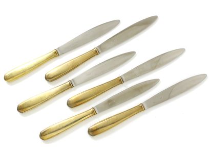 null Set of 6 cheese knives, the handles in vermeil with slight release, the blades...