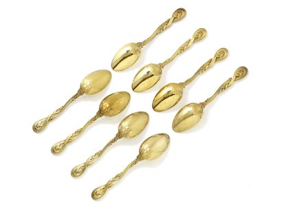 null Set of 20 dessert spoons in vermeil, the spatulas lanceolate with plant decoration....