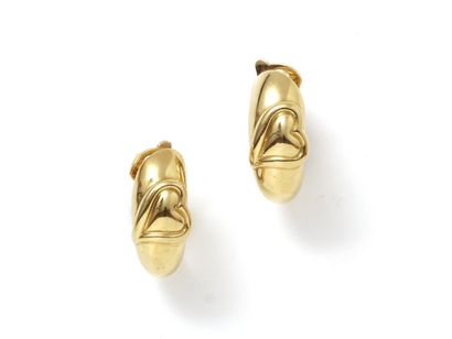 null BOUCHERON Pair of ear clips in gold 750 thousandths with heart decoration. Signed...