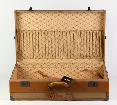 null 
LANCEL: Canvas suitcase with natural leather trim, metal lock with handle,...