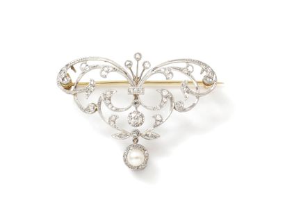 null Brooch pendant in gold 750 and platinum 850 thousandths, with delicately openwork...
