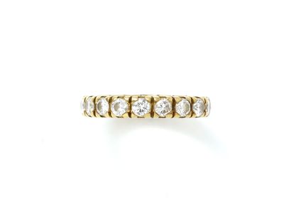 null FRED

American wedding ring in gold 750 thousandths, decorated with diamonds...