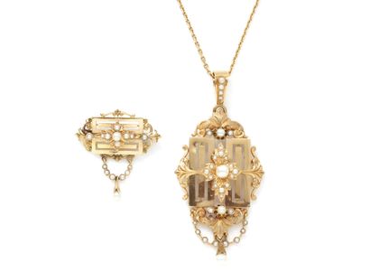 null Set in gold 750 thousandths, consisting of an openwork pendant centered on a...
