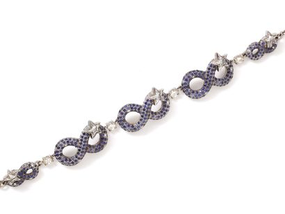 null Articulated bracelet in white gold 750 thousandths composed of motifs representing...