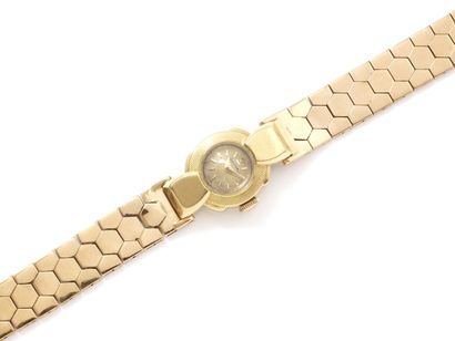 null OMEGA

Ladies' wristwatch in gold 750 thousandths, slightly stained gold dial...