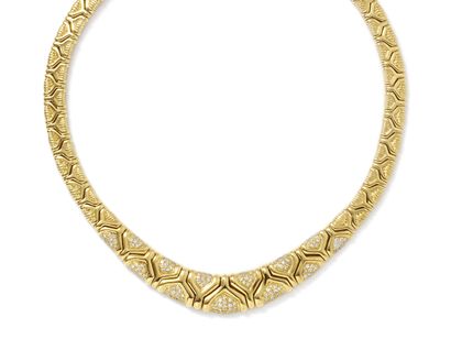 null Articulated necklace in gold 750 thousandths composed of a fall of geometrical...