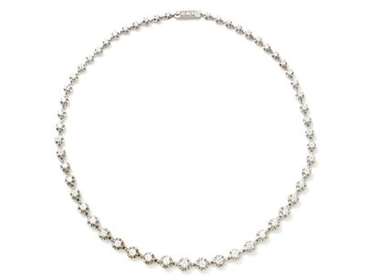 null 
 
Necklace in white gold 750 thousandths, composed of a fall of round links...