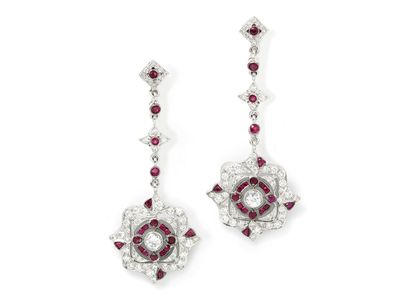 null Pair of earrings in white gold 750 thousandths, holding an articulated chenille...