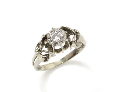 null Ring in white gold 750 and platinum 850 thousandths, decorated with a diamond...