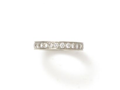 null VAN CLEEF & ARPELS

American wedding band in platinum 850 thousandths, set with...