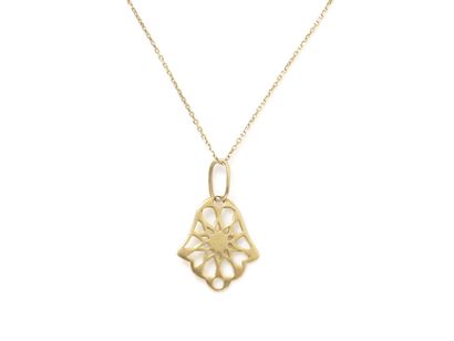null Pendant in gold 750 thousandth openwork representing the hand of Fatma. It is...