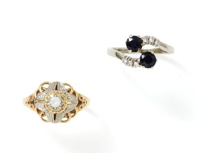 null Lot 2 tones of gold 750, composed of 2 rings enhanced with sapphires, diamonds...