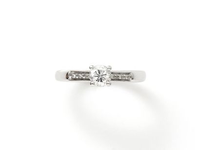 null MAUBOUSSIN

Solitaire ring in white gold 750 thousandths, decorated with a brilliant-cut...