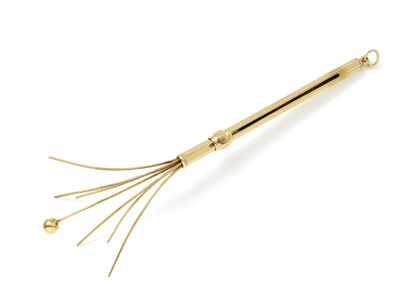null ASPREY

Retractable champagne stirrer in gold 750 thousandths finely guilloche....