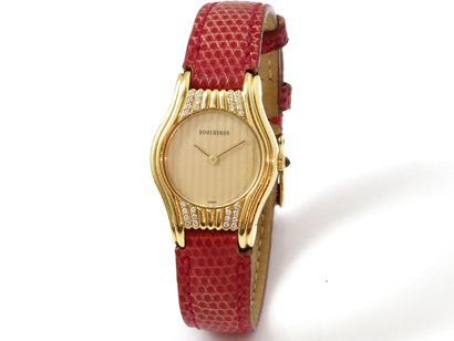null BOUCHERON 

Bracelet watch of lady in gold 750 thousandths, grooved round gilded...