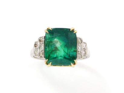 null 
Ring gold 750 and platinum 850 thousandth, ornamented with a rectangular emerald...