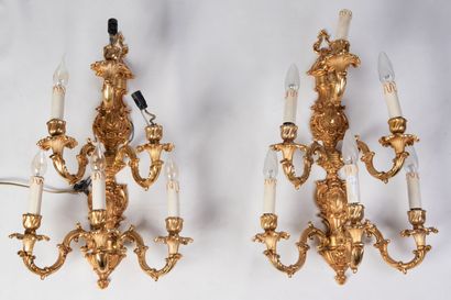 null A pair of gilt bronze wall sconces Louis XV style. Height : 66cm. 