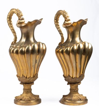 Pair of gilt bronze vases with dragon handles....