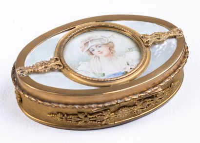 small oval box with mother-of-pearl lid and...