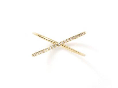 null Gold ring 585 thousandths with crossed decoration heightened by a line of brilliant...