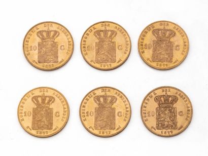 null Lot en or 750 millièmes, composé de:
6 pièces de 10 florins or hollandais datées...