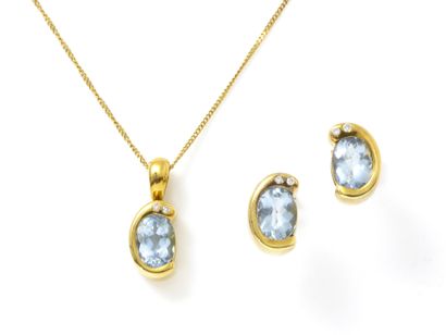 null Demi-parure en or 750 millièmes décorée d'aigues-marines ponctuées de diamants...