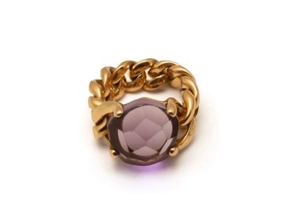 null POMELLATO
Soft ring in 750 thousandths gold set with a faceted amethyst cabochon....
