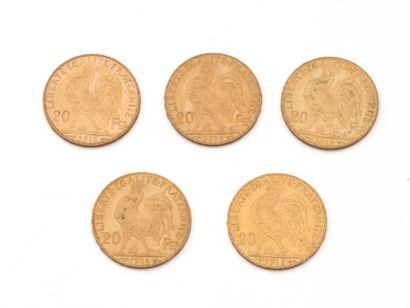null Lot in 750 thousandths gold, consisting of:
3 French 20 franc coins dated 1913,...