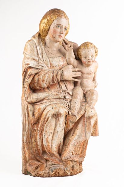 null Une statue en bois polychrome représentant la vierge à l'enfant XVIIIème. Hauteur...