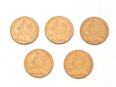 null Lot en or 750 millièmes, composé de:
2 pièces de 20 francs français datées 1910,...